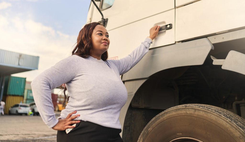 Logistics,,Ecommerce,And,African,Driver,With,Delivery,With,A,Truck